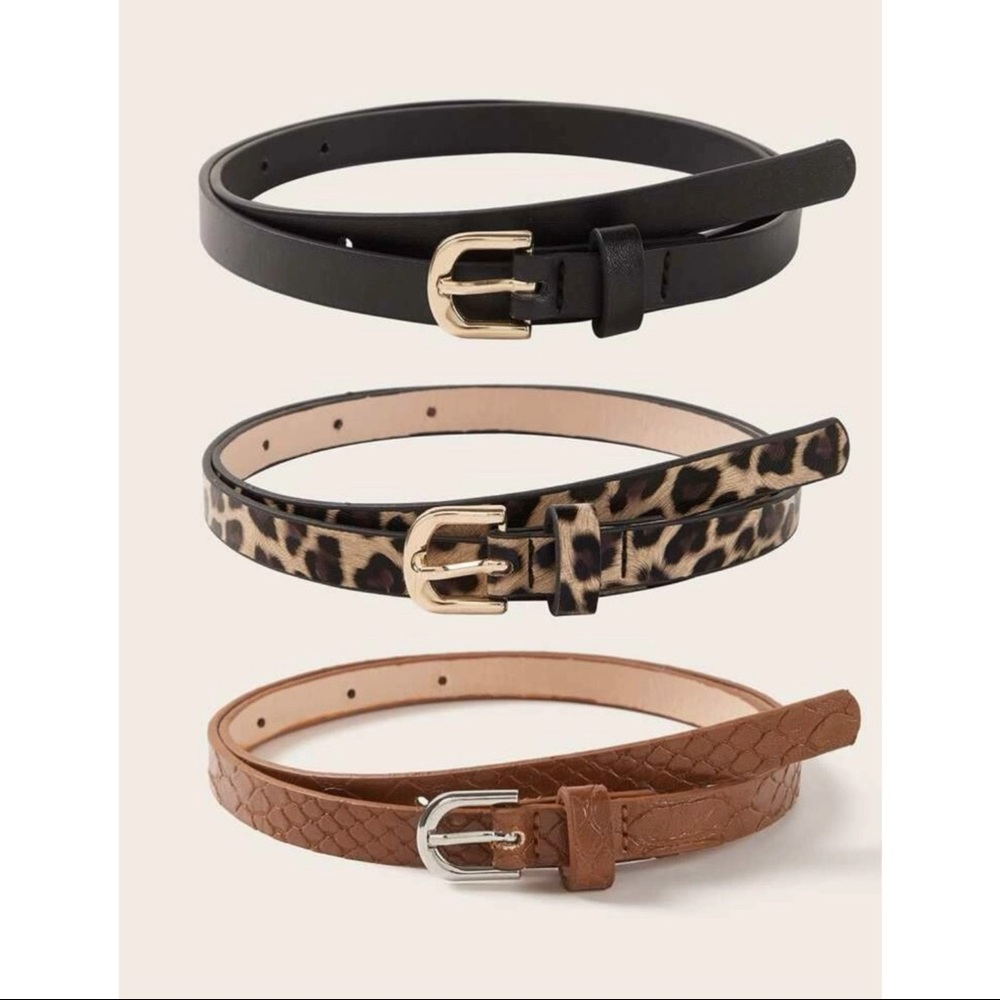 Leopard print, black, and brown belts with buckle